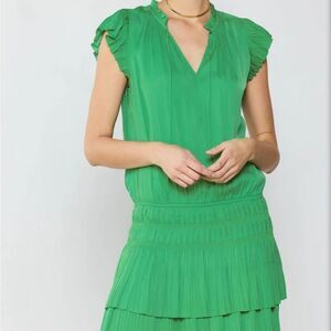Cute summer dress worn once! Size medium and is pleated around waste.